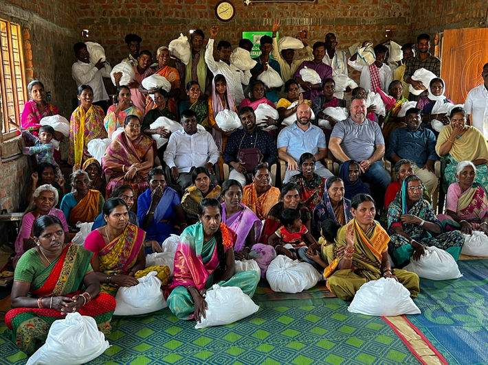 Family receiving groceries and practical care